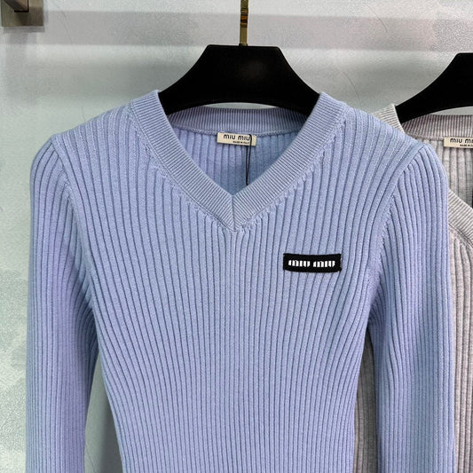 Ribbed High-Neck Wool Sweater